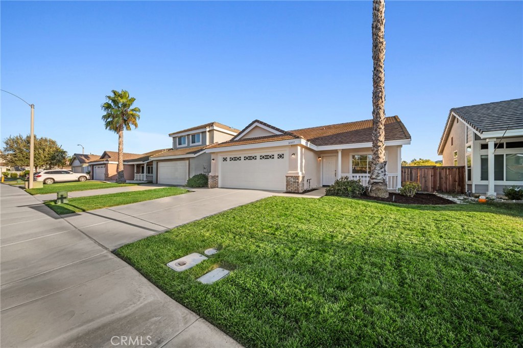 31577 Via Santa Ines Temecula, CA 92592 - Photo 3 of 49 a view of a big house with a big yard and large trees