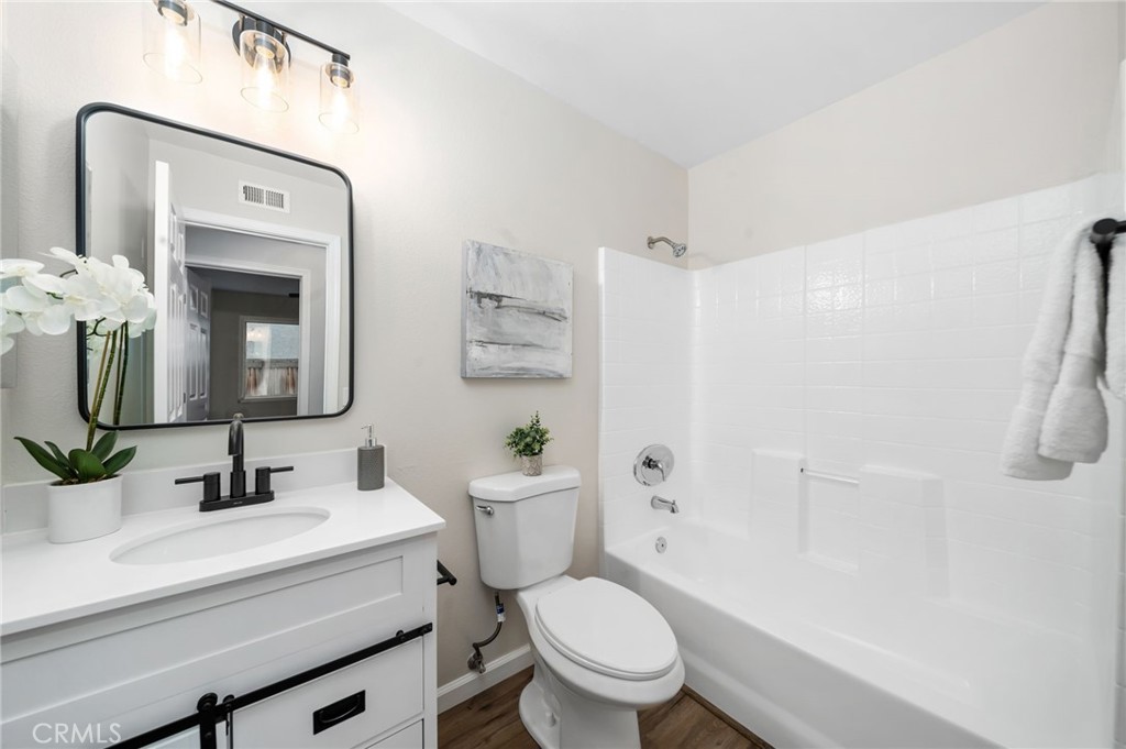 31577 Via Santa Ines Temecula, CA 92592 - Photo 34 of 49 a bathroom with a sink a toilet and shower