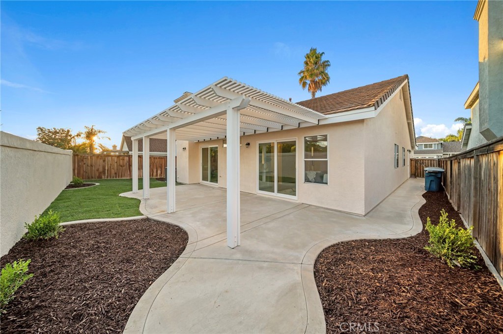 31577 Via Santa Ines Temecula, CA 92592 - Photo 39 of 49 a view of a house with a yard
