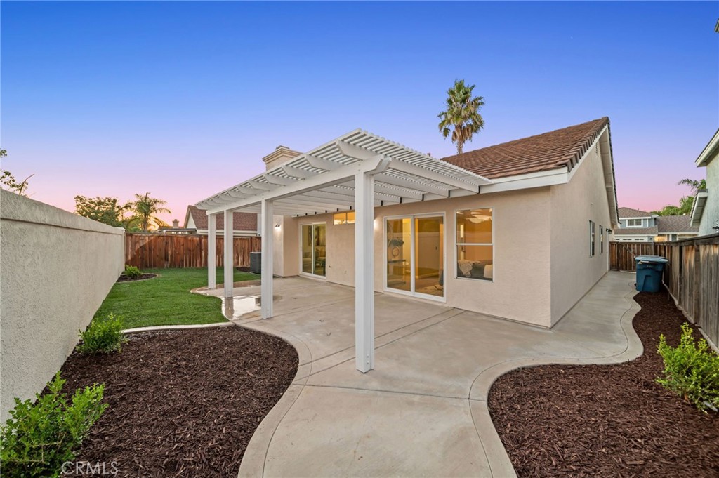 31577 Via Santa Ines Temecula, CA 92592 - Photo 41 of 49 a front view of a house with a yard