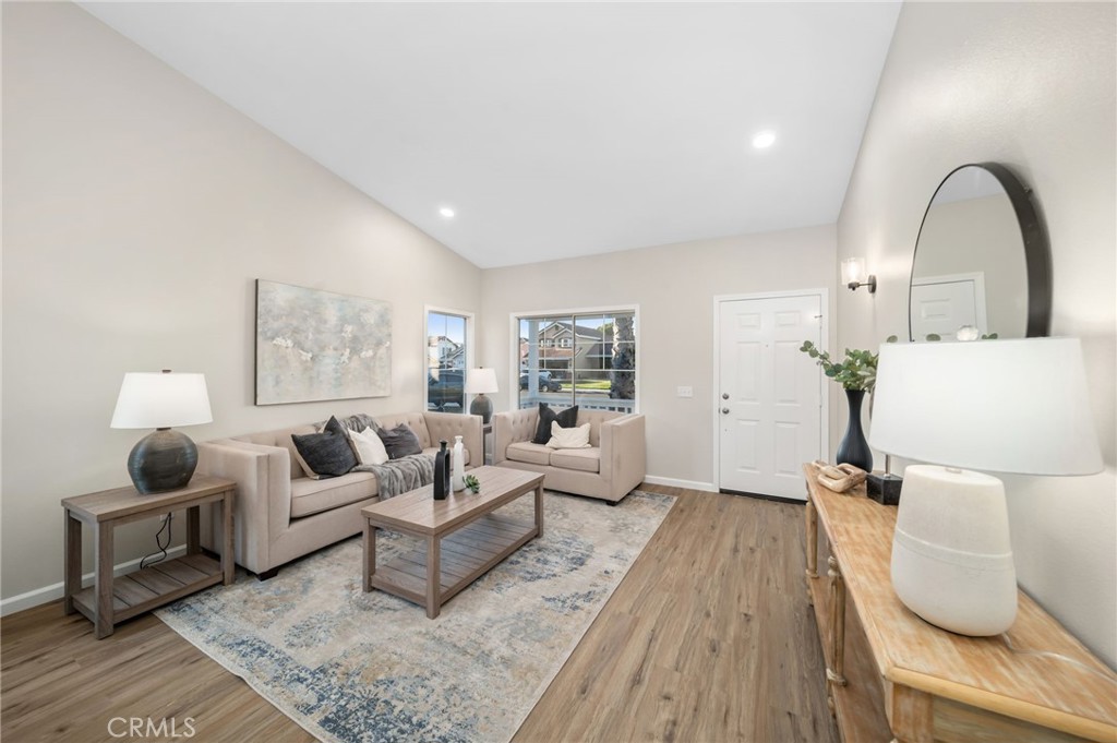 31577 Via Santa Ines Temecula, CA 92592 - Photo 8 of 49 a living room with furniture and wooden floor