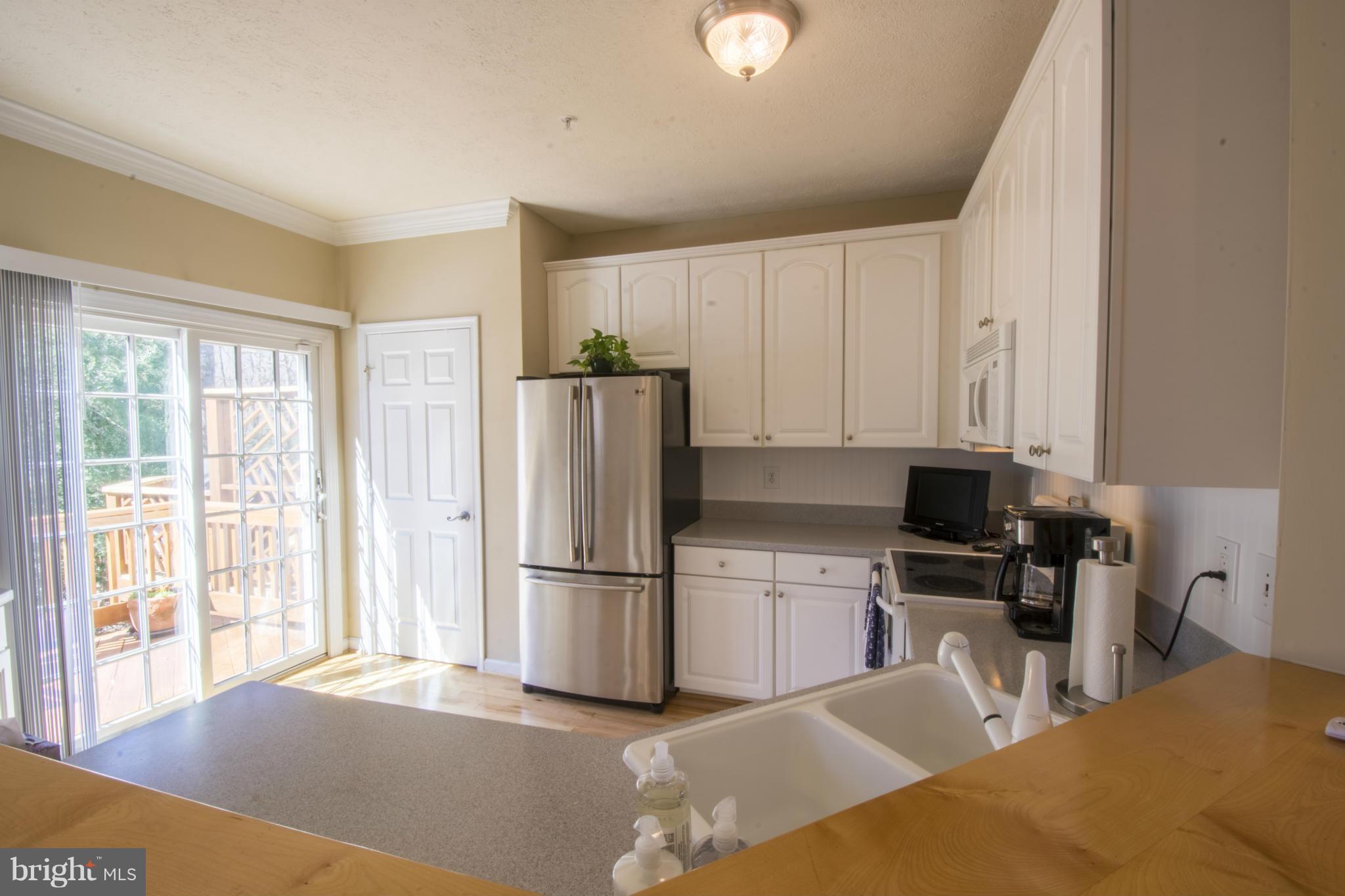 1270 Breckenridge Circle Riva, MD 21140 - Photo 10 of 30 Kitchen With Sliding Door To Deck