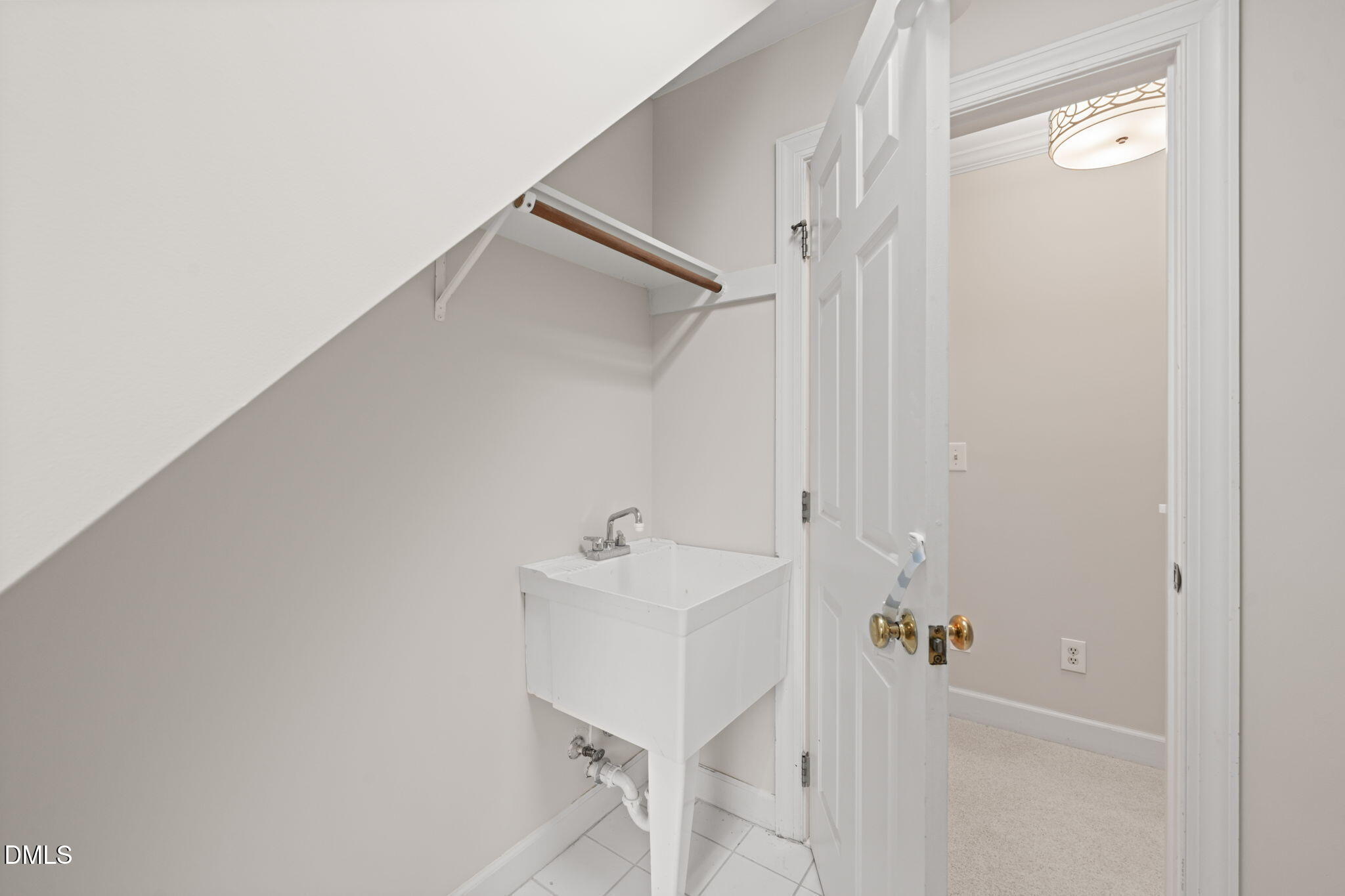 5809 Stone Spring Road Raleigh, NC 27613 - Photo 37 of 54 a bathroom with a sink and shower