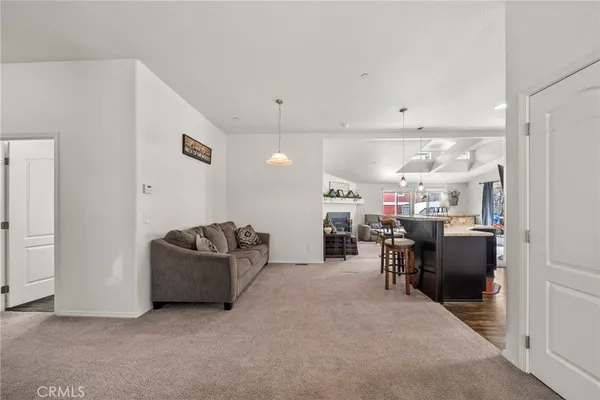 a bedroom with a balcony a bed and a television