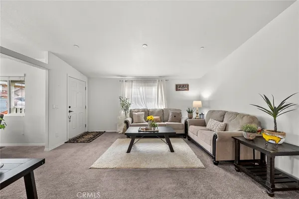 a living room with furniture and a couch