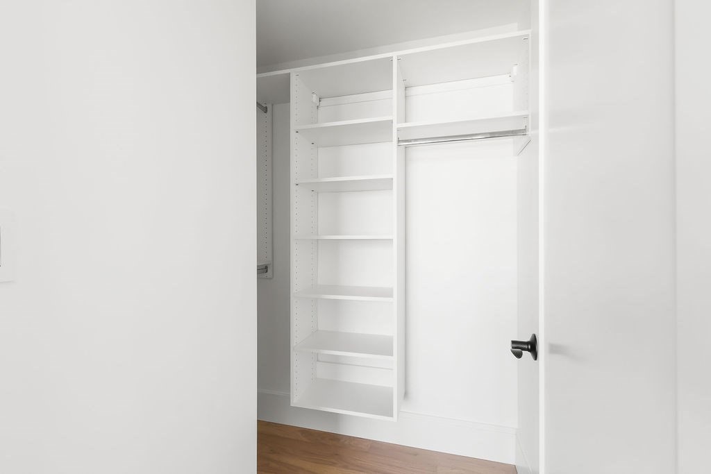 230 Washington Street, Unit 4 Boston, MA 02135 - Photo 8 of 13 a view of walk in closet with empty racks