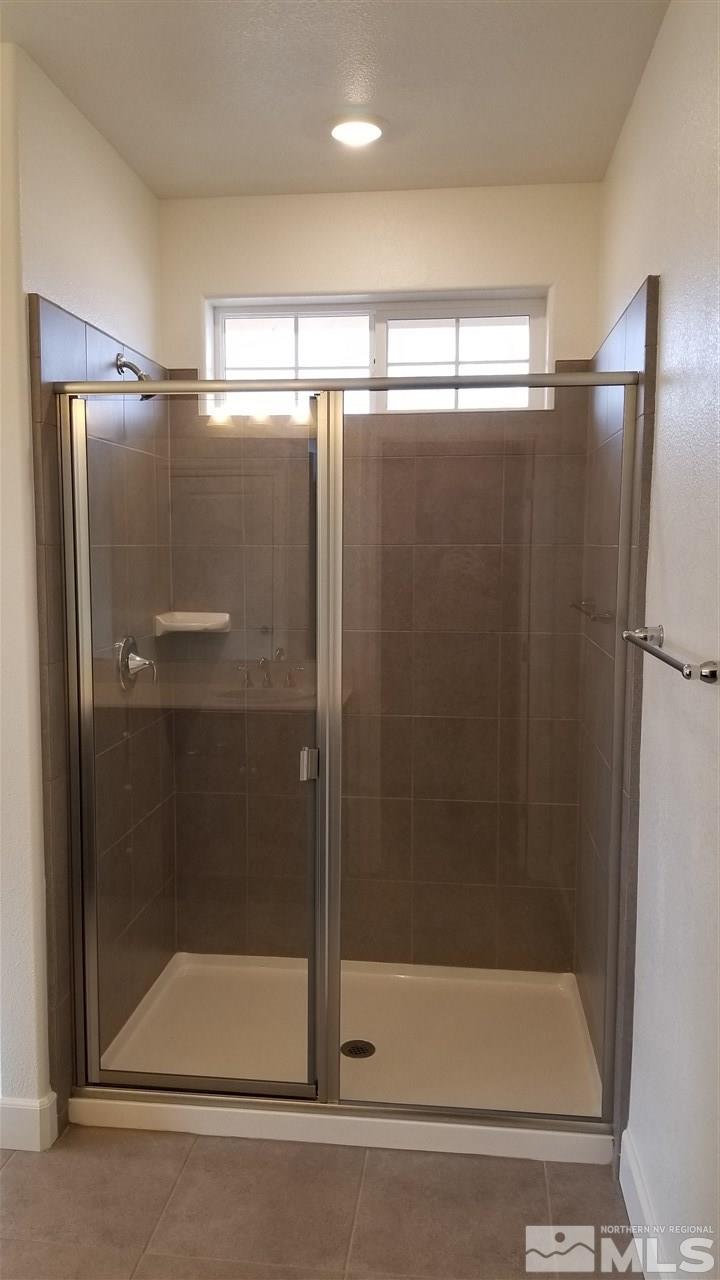 1915 Sea Horse Road, Unit C Reno, NV 89521 - Photo 6 of 9 a bathroom with a shower