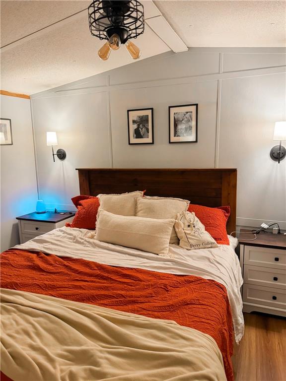 10 Lindsey Lane Northwest Rome, GA 30165 - Photo 11 of 14 a bedroom with a bed and a night stand