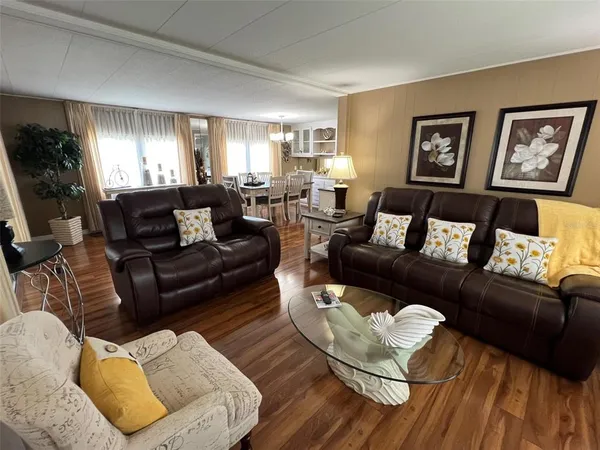 a living room with furniture or couch and a window