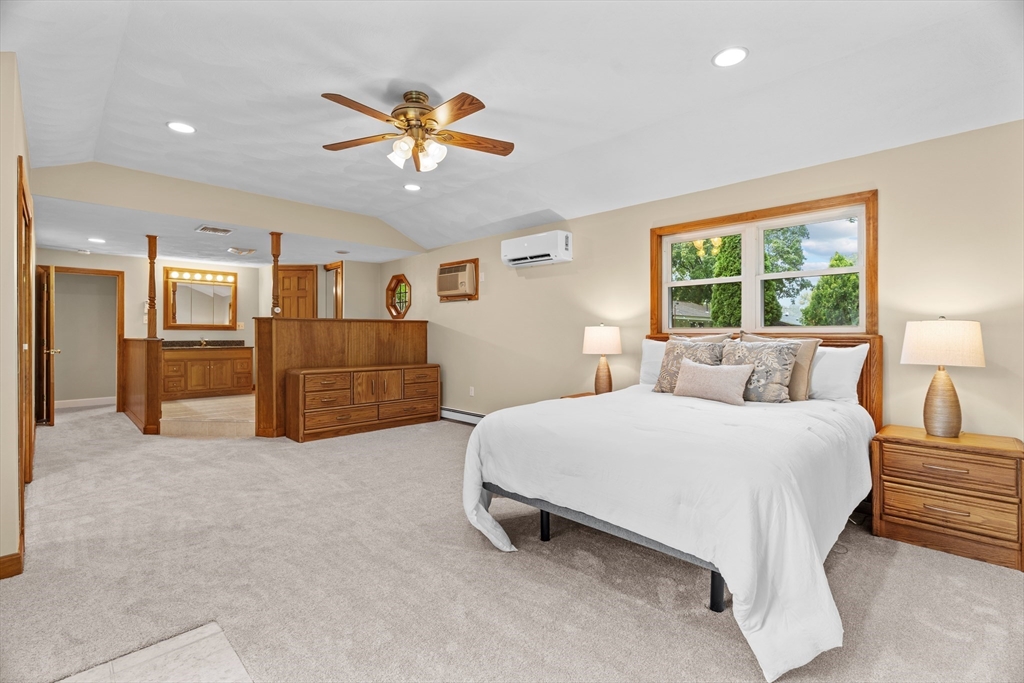 55 Eaton Road Framingham, MA 01701 - Photo 17 of 42 a spacious bedroom with a bed and ceiling fan