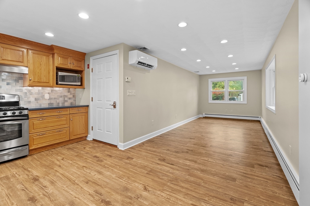 55 Eaton Road Framingham, MA 01701 - Photo 10 of 42 a view of a kitchen cabinets and wooden floor