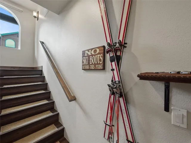 a view of entryway with wooden floor
