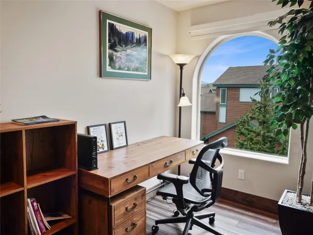 a view of a workspace with furniture
