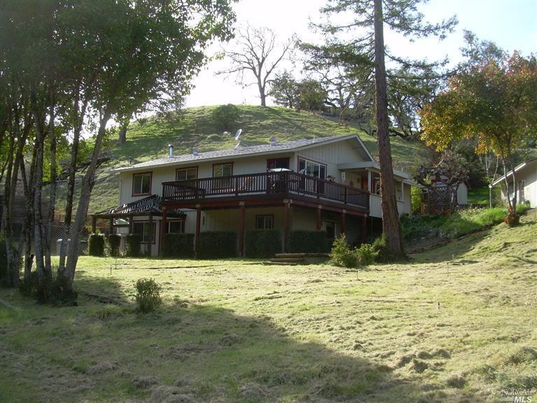 787 Riverside Drive Ukiah, CA 95482 - Photo 1 of 1 a view of house with a yard