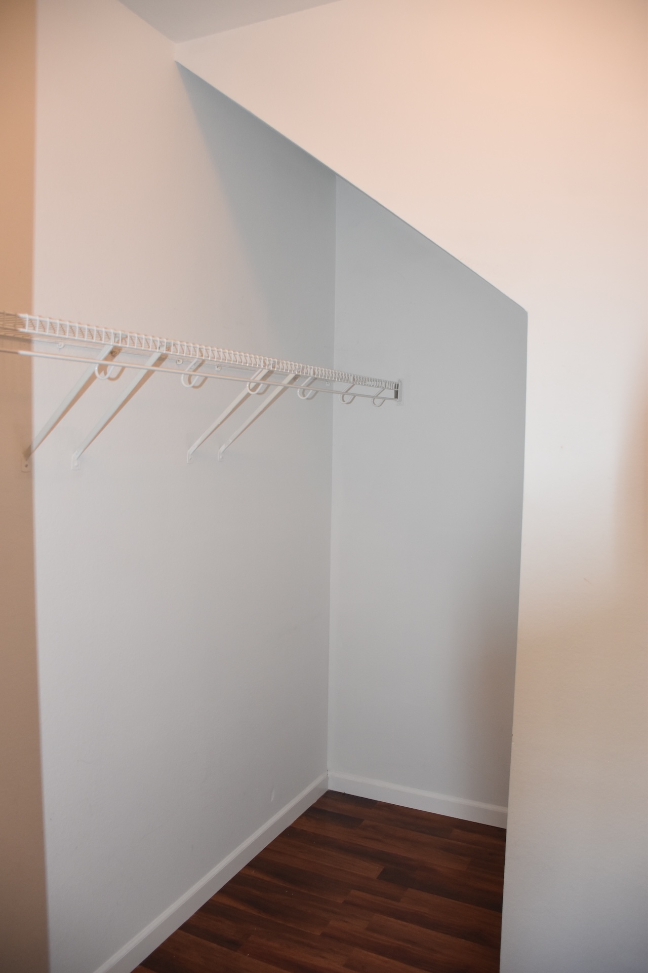 11300 Dimmit Street Manor, TX 78653 - Photo 13 of 23 Ample storage solutions abound in this well-appointed closet, featuring durable wire shelving and rich wood flooring.
