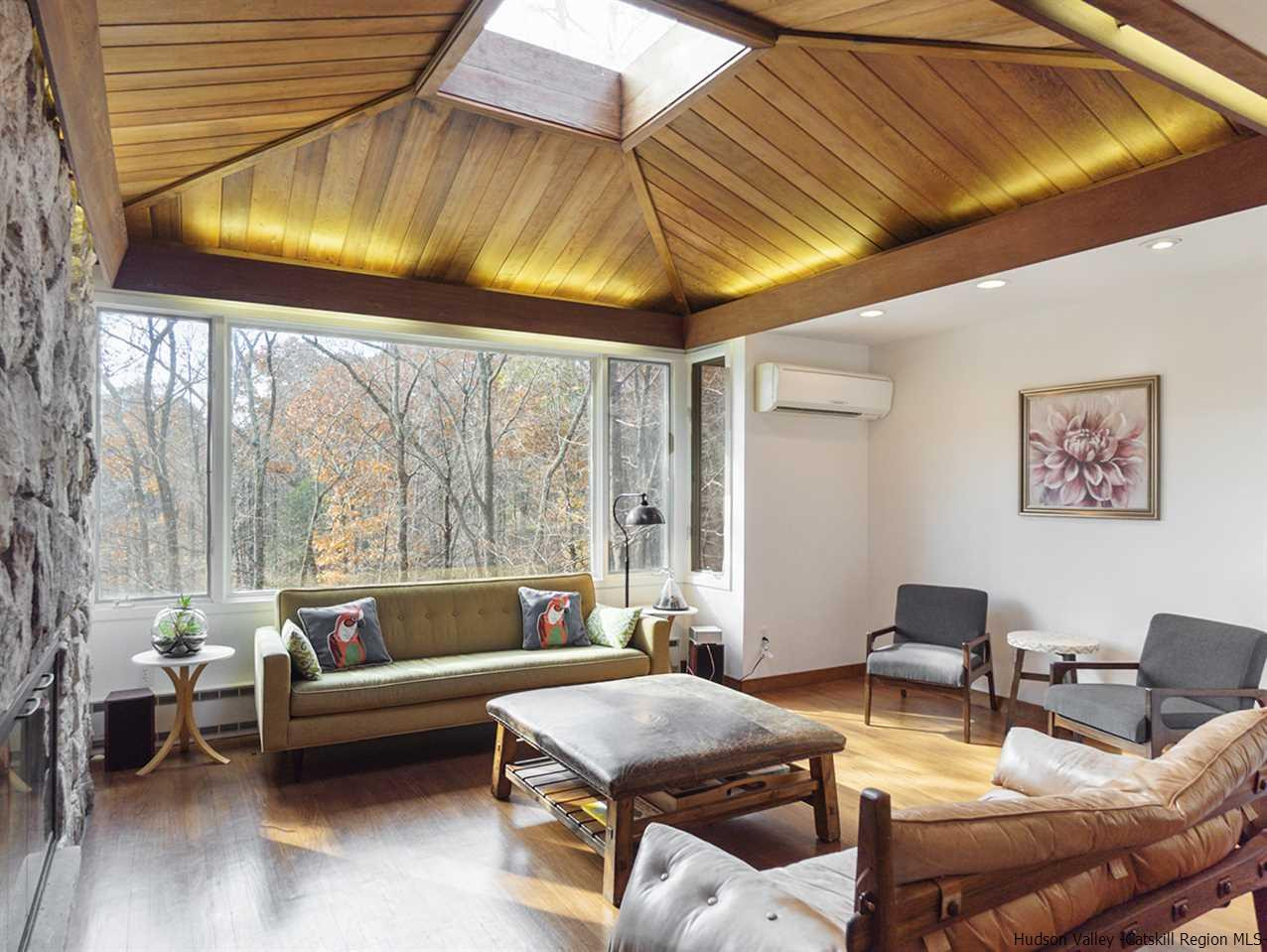 118 Sparkling Ridge Road New Paltz, NY 12561 - Photo 11 of 35 a living room with furniture and a large window
