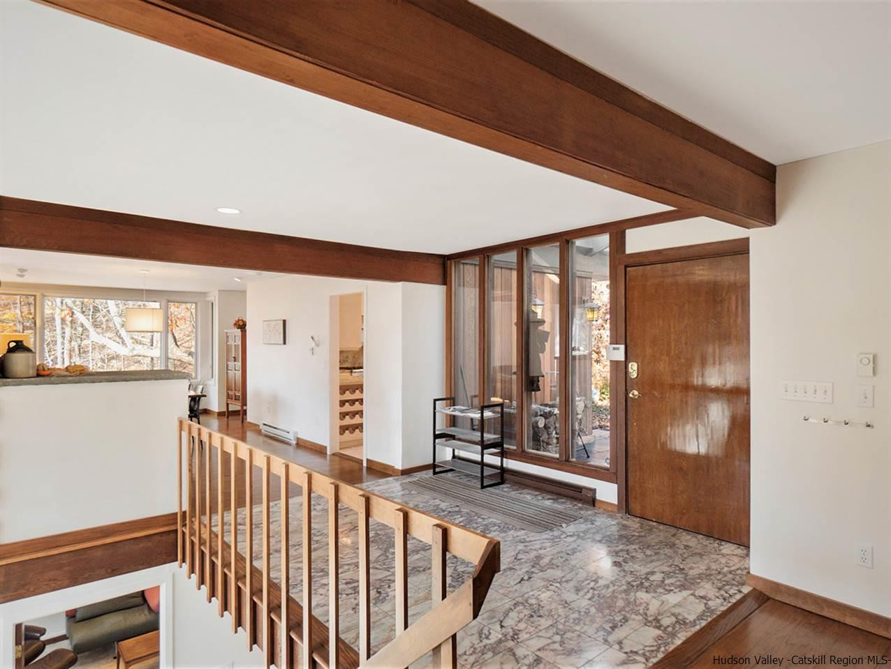 118 Sparkling Ridge Road New Paltz, NY 12561 - Photo 6 of 35 a view of an entryway with wooden floor and windows
