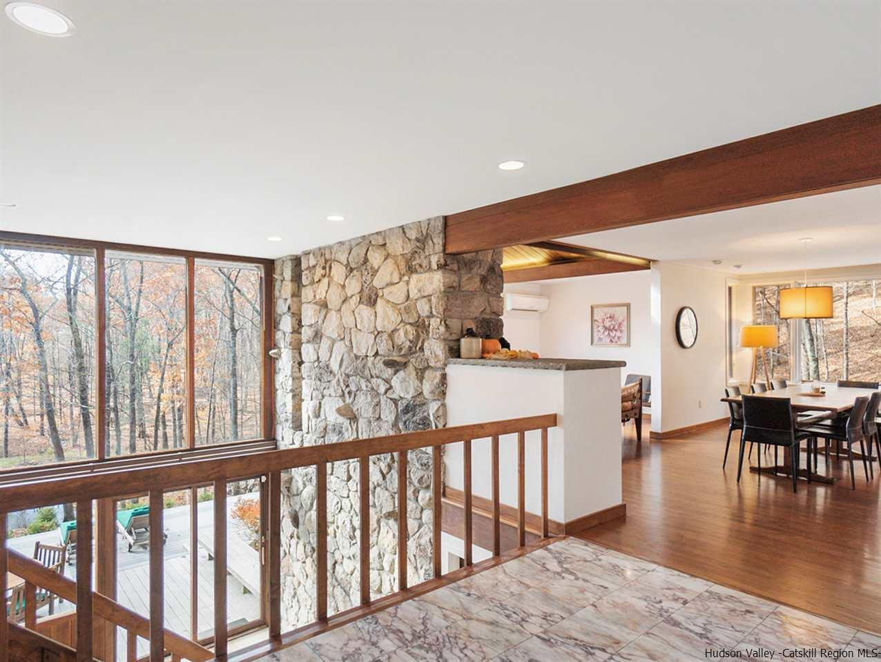 118 Sparkling Ridge Road New Paltz, NY 12561 - Photo 8 of 35 a view of a porch with wooden floor and outdoor space