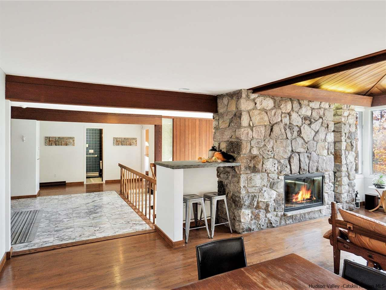 118 Sparkling Ridge Road New Paltz, NY 12561 - Photo 9 of 35 a living room with furniture and a fireplace