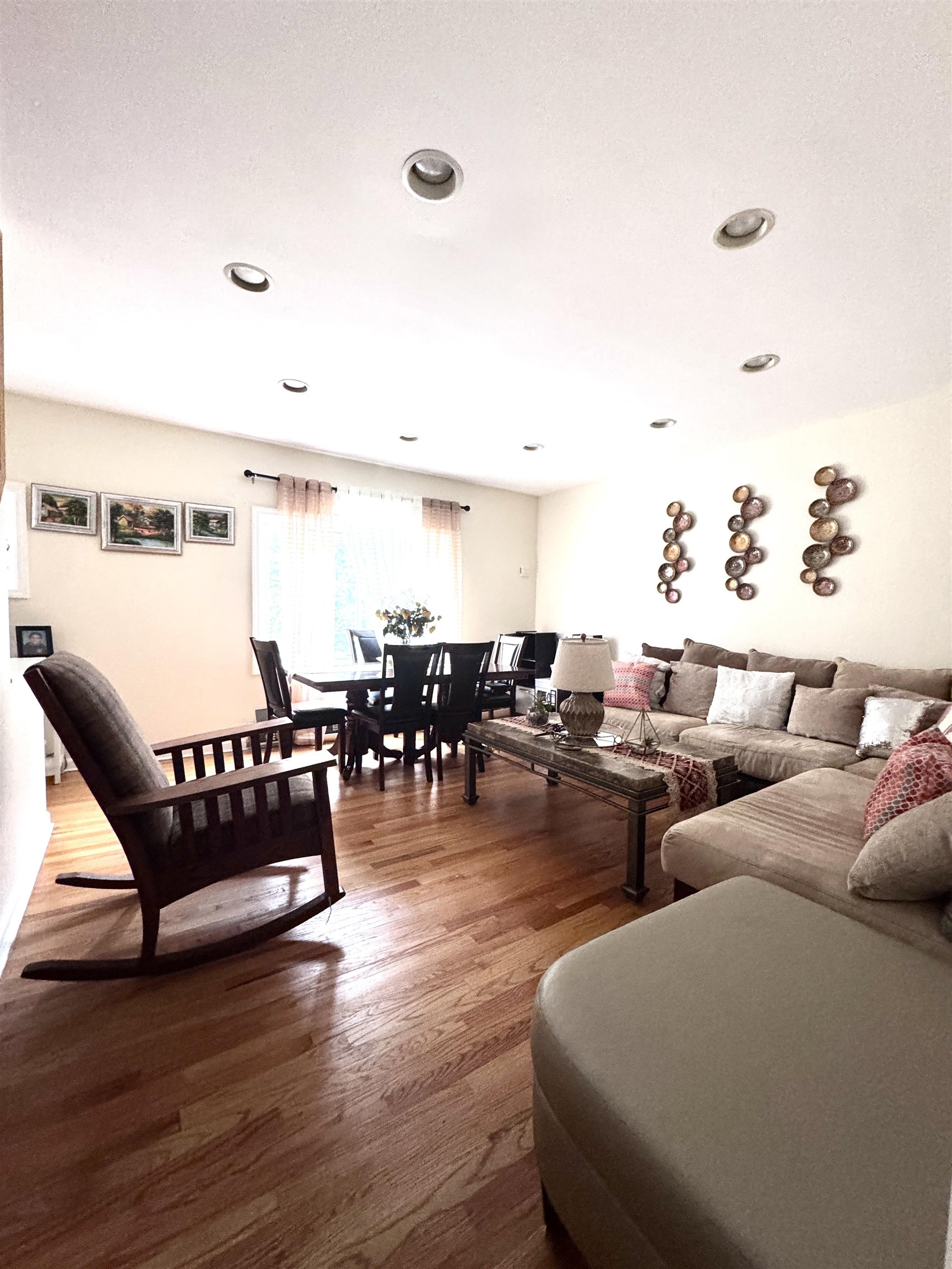 17 Green Court Lodi, NJ 07644 - Photo 11 of 21 a living room with furniture and wooden floor