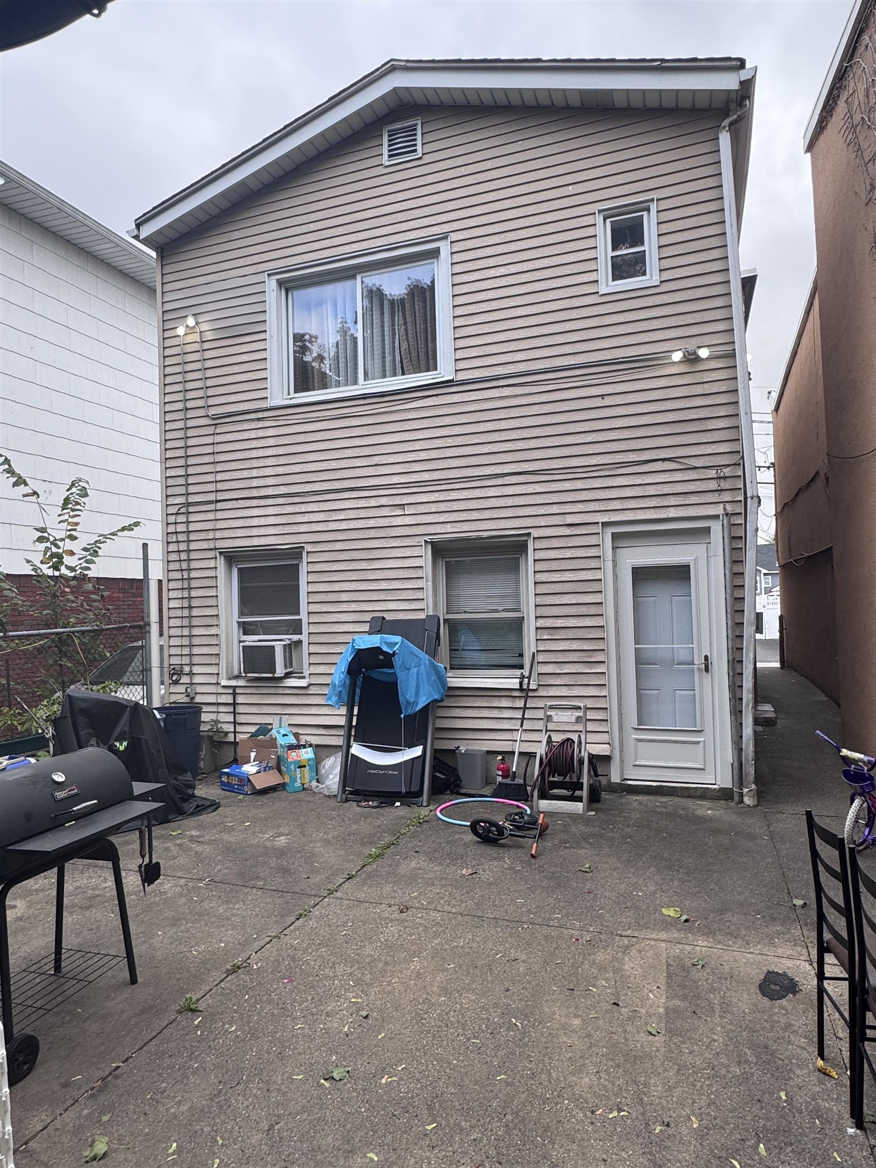17 Green Court Lodi, NJ 07644 - Photo 18 of 21 a view of a house with a patio