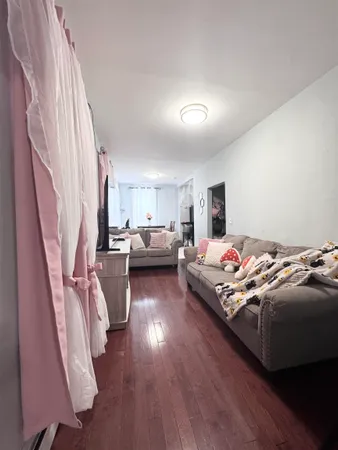 a bedroom with bed and a window