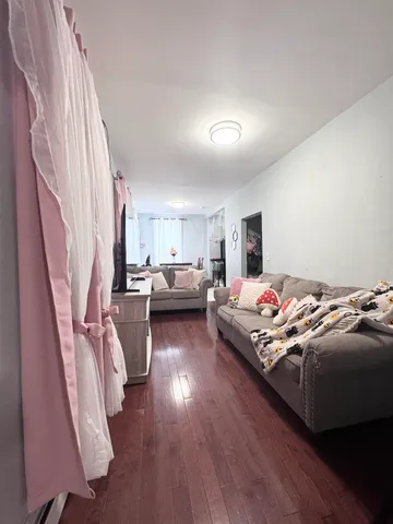 a bedroom with bed and a window