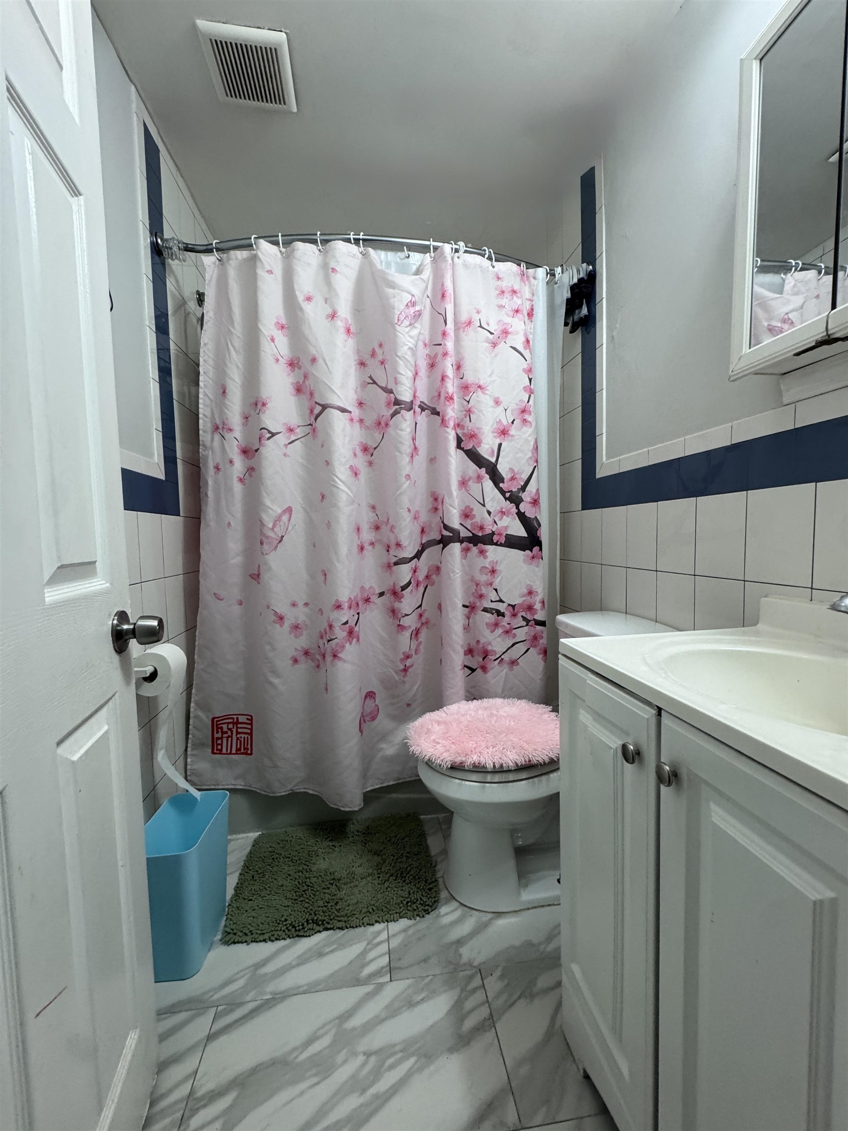 17 Green Court Lodi, NJ 07644 - Photo 7 of 21 a bathroom with a sink toilet and shower
