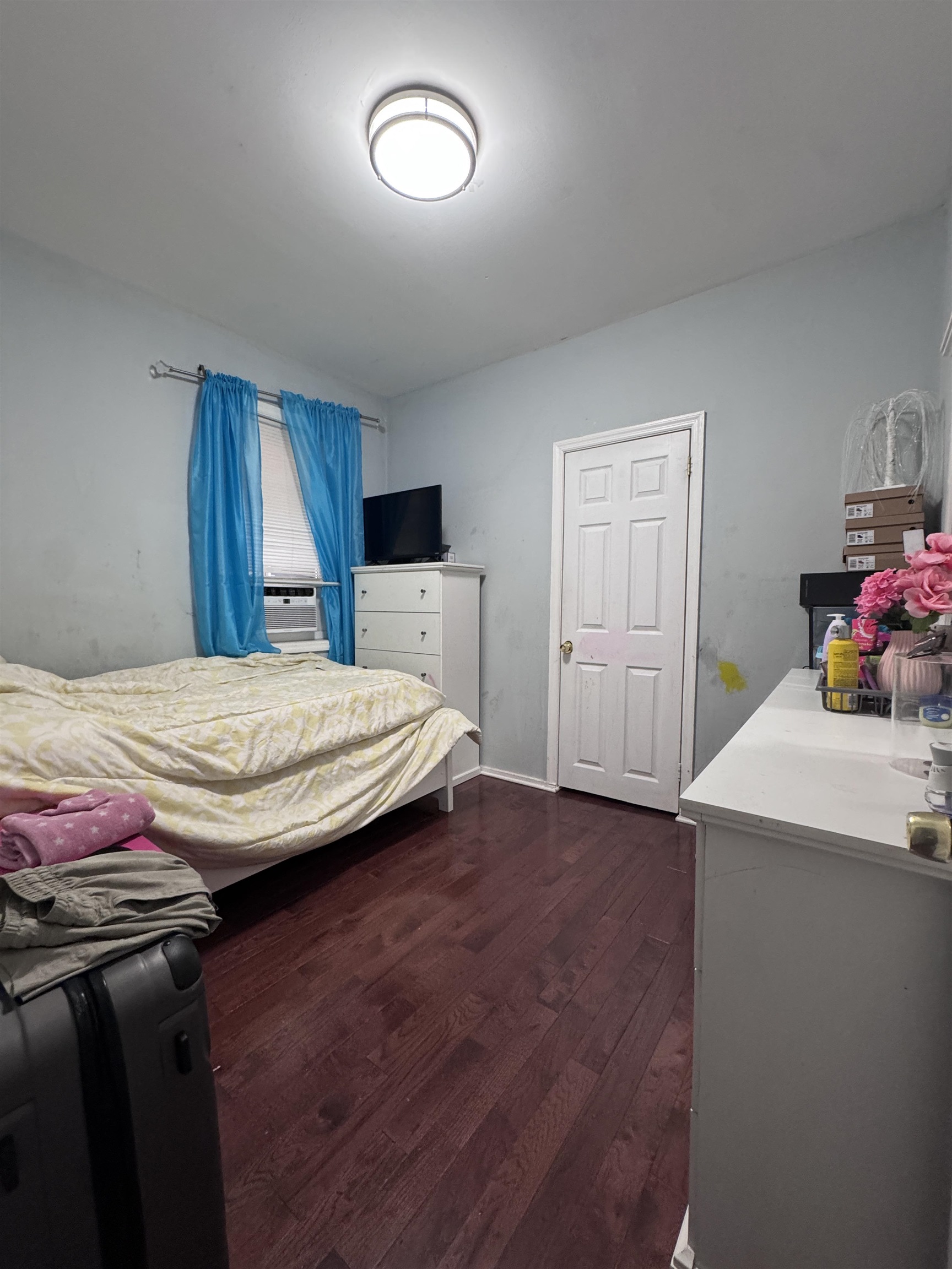 17 Green Court Lodi, NJ 07644 - Photo 8 of 21 a bedroom with a bed and a dresser