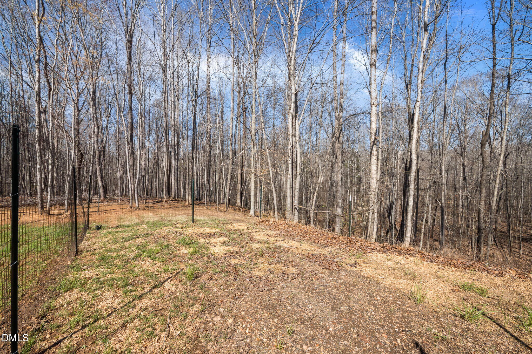 8514 Charlie Stovall Road Roxboro, NC 27574 - Photo 37 of 48 a view of outdoor space with wooden fence