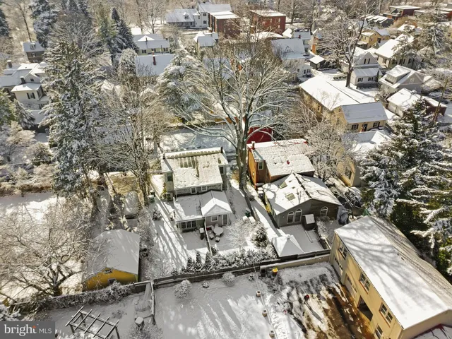 an aerial view of residential house with parking space