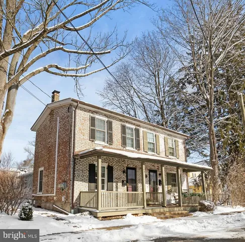 a front view of a building with street