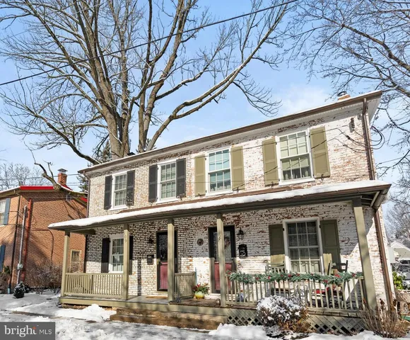 a front view of a building with street view