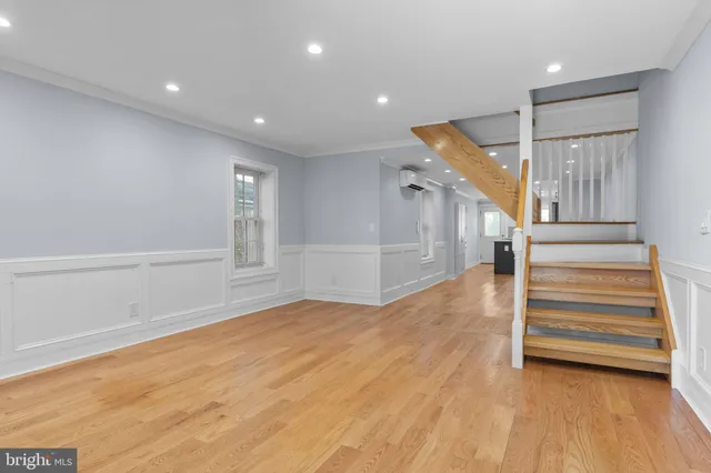 a view of entryway with wooden floor