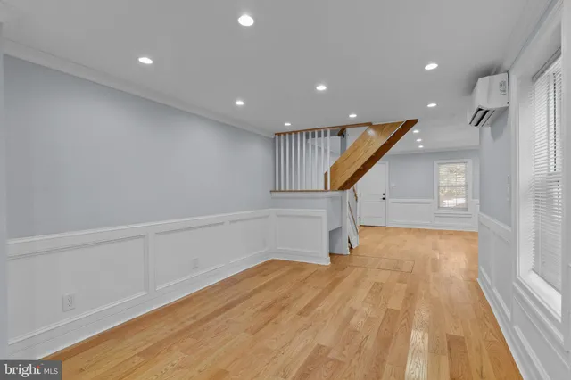a view of entryway with wooden floor