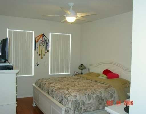 6318 West Sample Road, Unit B5 Coral Springs, FL 33067 - Photo 7 of 13 Master Bedroom