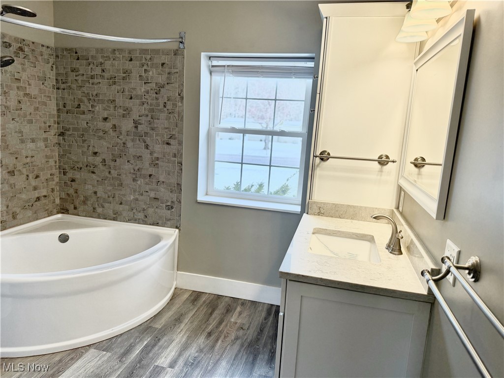 3024 Dutt Road Barberton, OH 44203 - Photo 28 of 33 BEAUTIFUL MASTER BATHROOM! TUB AND SHOWER, YOU GUESSED IT, NEW IN 2019, ALONG WITH THE REST OF THE BATHROOM.