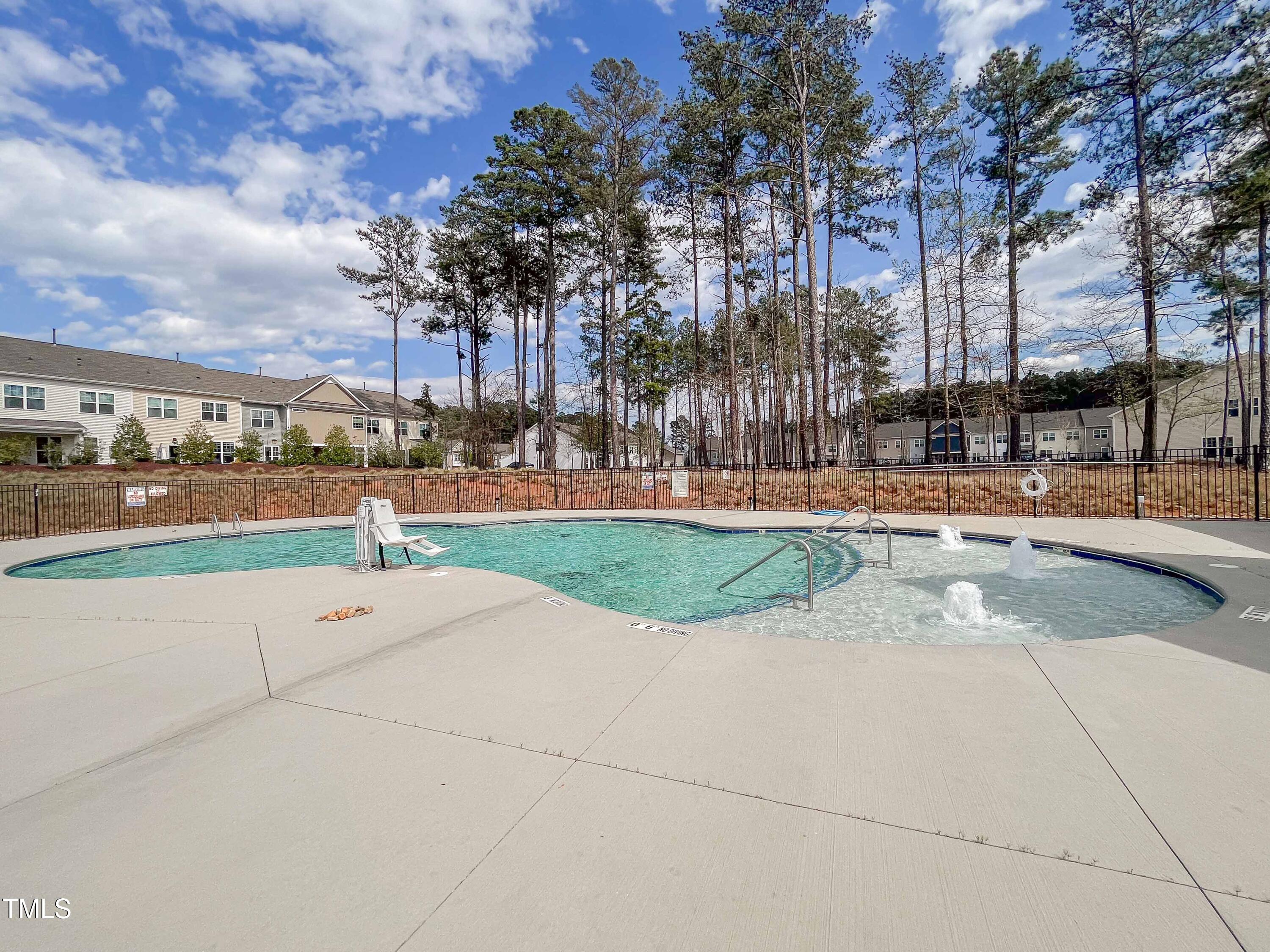 6027 Beale Loop Raleigh, NC 27616 - Photo 21 of 21 a view of yard with swimming pool and green space