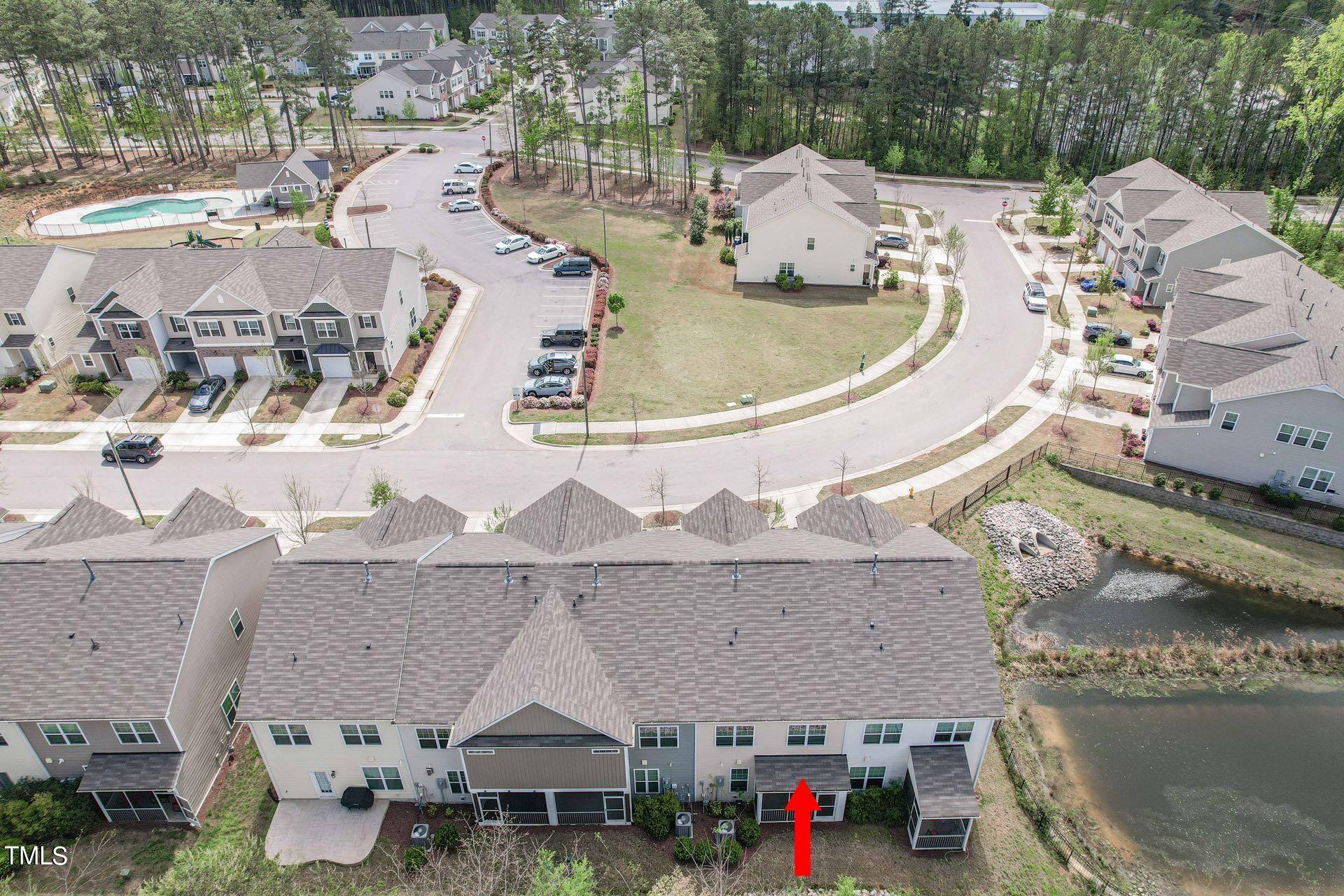 6027 Beale Loop Raleigh, NC 27616 - Photo 3 of 21 an aerial view of a house with sitting space and a lake view