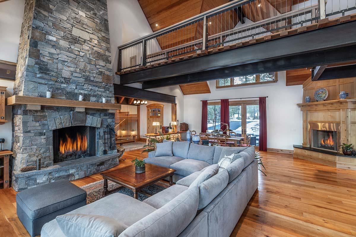 556 Stewart McKay Truckee, CA 96161 - Photo 6 of 21 a living room with furniture and a fireplace