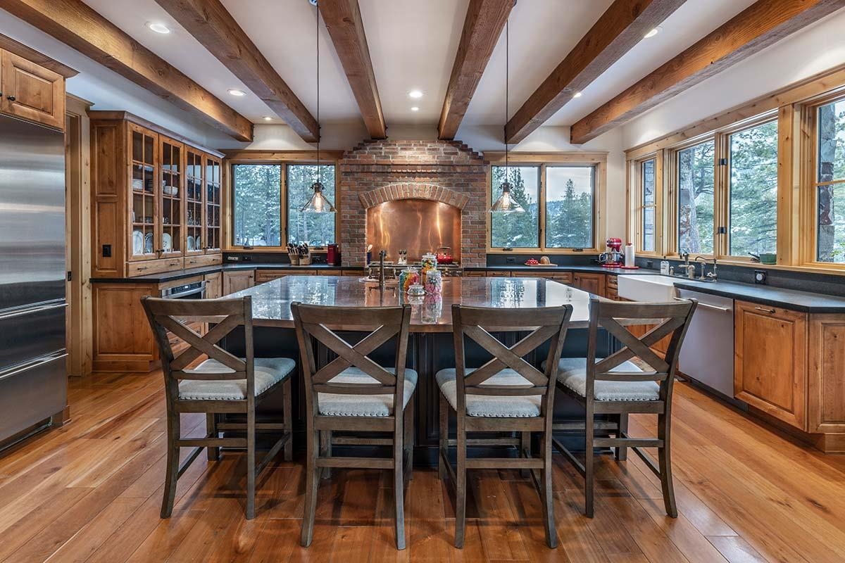 556 Stewart McKay Truckee, CA 96161 - Photo 9 of 21 a view of a dining room with furniture window and wooden floor