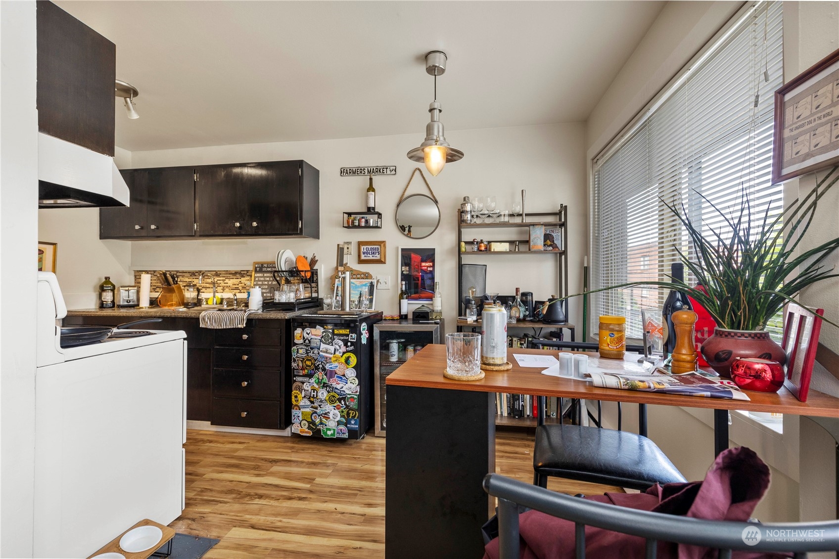 601 East Roy Street Seattle, WA 98102 - Photo 14 of 26 a kitchen with lots of counter top space and furniture