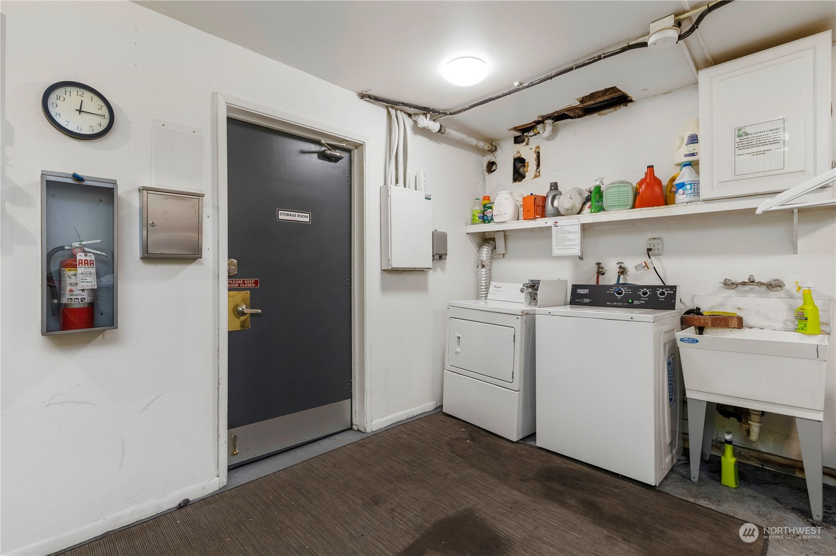 601 East Roy Street Seattle, WA 98102 - Photo 26 of 26 a room with storage and utility