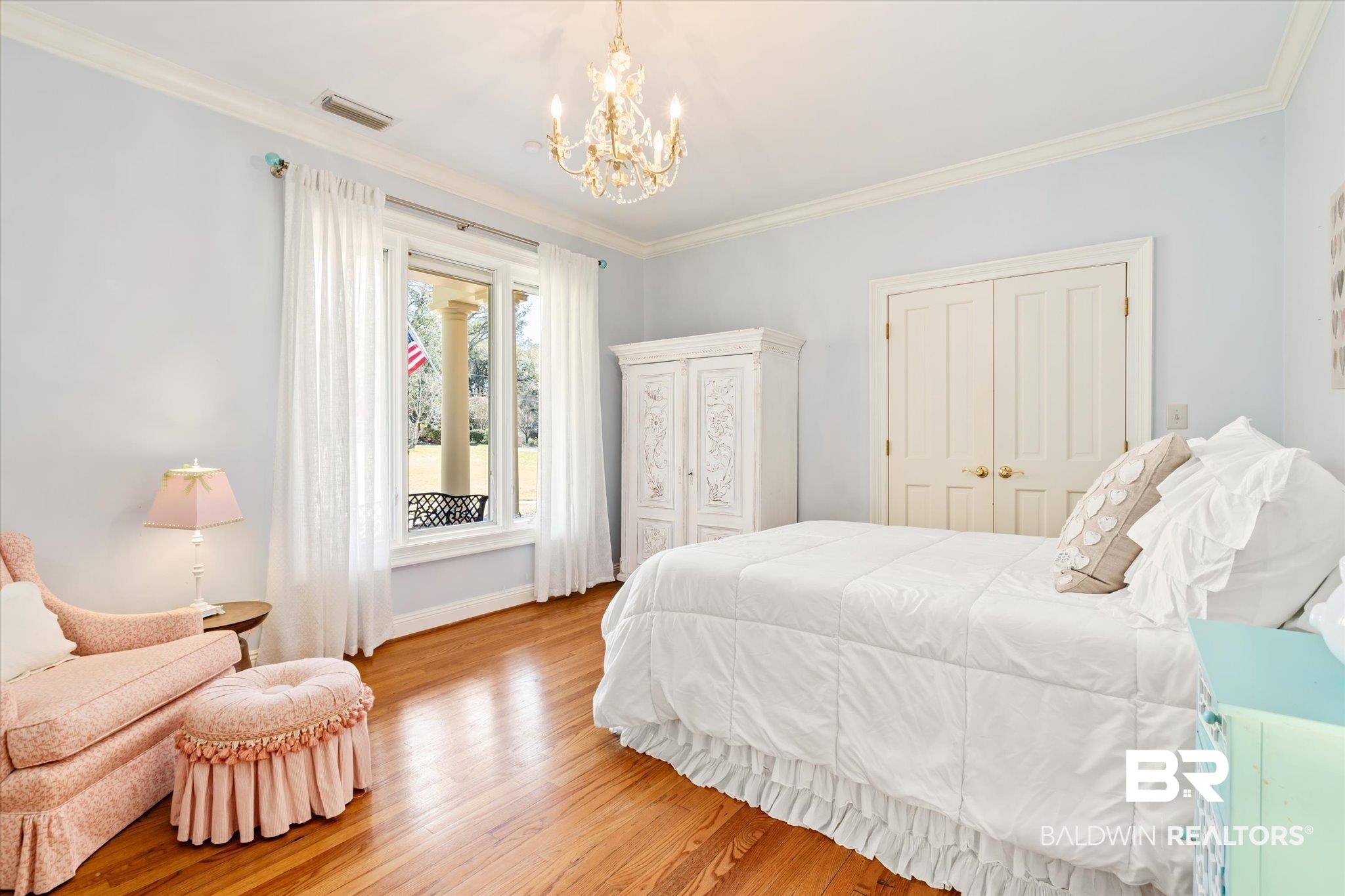 4 Kingsway Mobile, AL 36608 - Photo 23 of 44 Bedroom featuring visible vents, crown molding, and wood finished floors