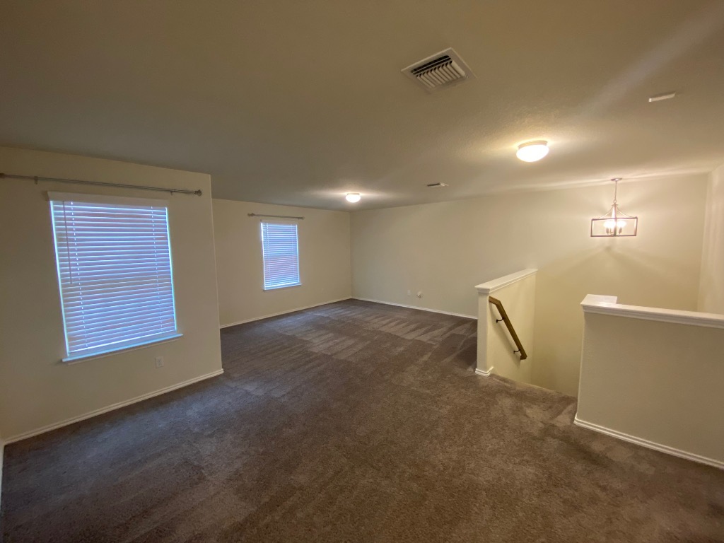 97 Quarryman Drive Hutto, TX 78634 - Photo 21 of 37 a view of a room with windows