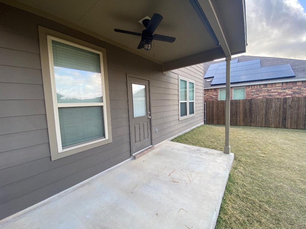 97 Quarryman Drive Hutto, TX 78634 - Photo 34 of 37 a view of a house with a backyard