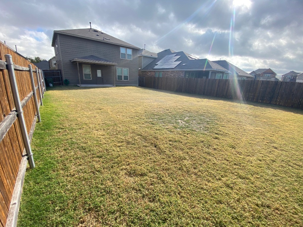 97 Quarryman Drive Hutto, TX 78634 - Photo 37 of 37 a view of a house with a yard