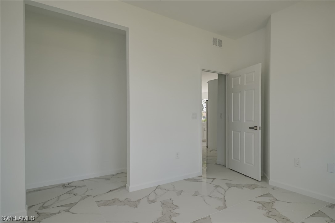 6017 Ruth Avenue North Lehigh Acres, FL 33971 - Photo 12 of 25 a view of an empty room