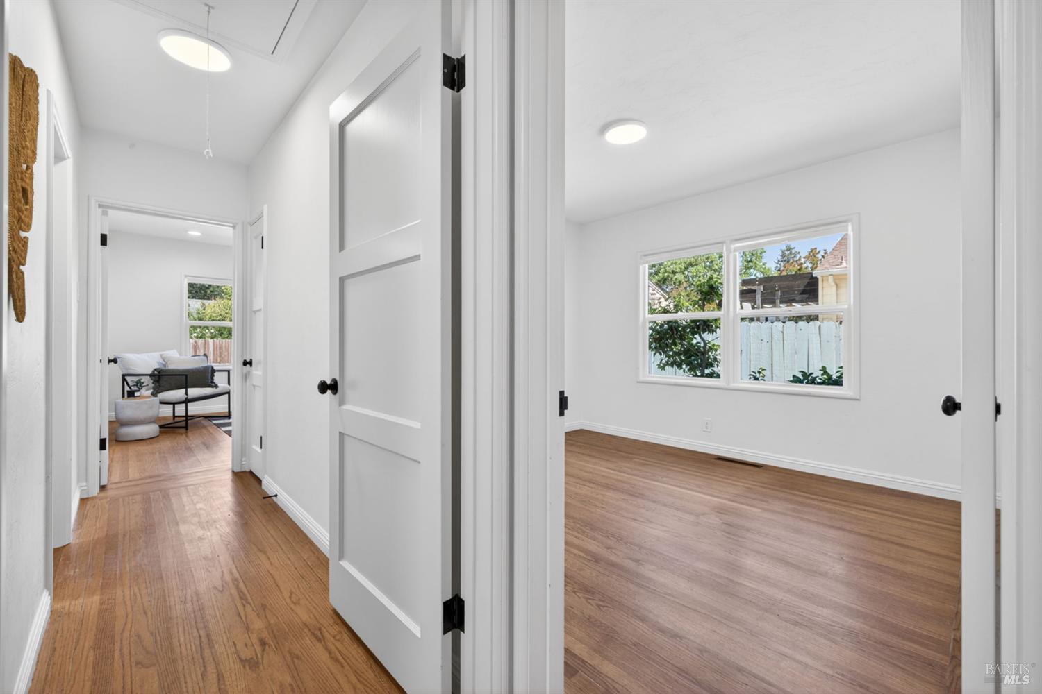 2211 Humboldt Street Santa Rosa, CA 95404 - Photo 29 of 52 a view of a hallway view with wooden floor and staircase
