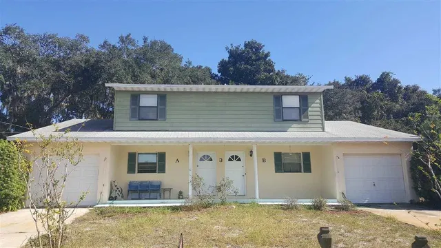a front view of house with yard
